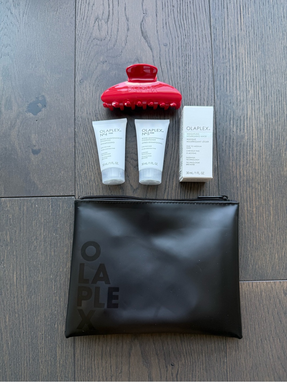 OLAPLEX Travel Pouch with Mini Treatments and Red Hair Clip